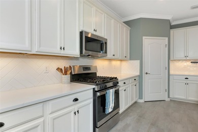 Under contract-accepting backup offers. This Summerville model on Lakewood National Golf Club in Florida - for sale on GolfHomes.com, golf home, golf lot