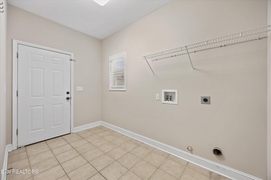 Welcome to this beautiful 4 bedroom, 3 bath standalone in the on The Preserve 9 Hole Golf Course in Tennessee - for sale on GolfHomes.com, golf home, golf lot