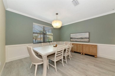 Under contract-accepting backup offers. This Summerville model on Lakewood National Golf Club in Florida - for sale on GolfHomes.com, golf home, golf lot