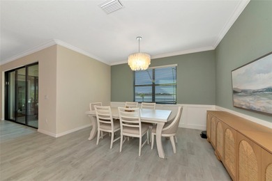 Under contract-accepting backup offers. This Summerville model on Lakewood National Golf Club in Florida - for sale on GolfHomes.com, golf home, golf lot