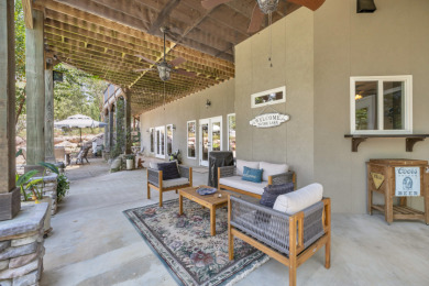 LAKEFRONT RETREAT on The Patriot Golf Club At Grand Harbor in South Carolina - for sale on GolfHomes.com, golf home, golf lot