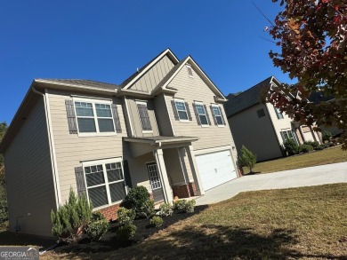 The spacious home features 5 bedrooms, 3 full baths, and a 2-car on Canongate At Heron Bay in Georgia - for sale on GolfHomes.com, golf home, golf lot