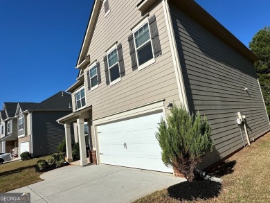 The spacious home features 5 bedrooms, 3 full baths, and a 2-car on Canongate At Heron Bay in Georgia - for sale on GolfHomes.com, golf home, golf lot