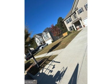 The spacious home features 5 bedrooms, 3 full baths, and a 2-car on Canongate At Heron Bay in Georgia - for sale on GolfHomes.com, golf home, golf lot