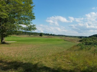 Take in the breath-taking views of the 13th fairway at Black on Black Bear Golf Club in Michigan - for sale on GolfHomes.com, golf home, golf lot