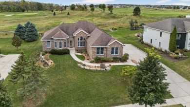Discover this beautifully updated 4-bedroom, 3.5-bath home in on Hawks Landing Golf Club in Wisconsin - for sale on GolfHomes.com, golf home, golf lot