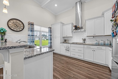 Experience refined coastal living in this rare Evans Park beauty on International Club of Myrtle Beach in South Carolina - for sale on GolfHomes.com, golf home, golf lot