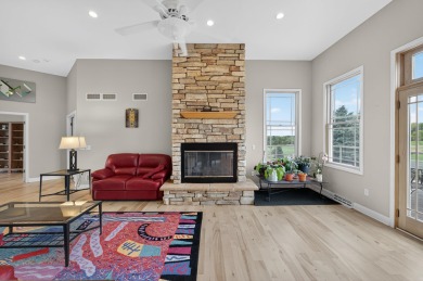 Discover this beautifully updated 4-bedroom, 3.5-bath home in on Hawks Landing Golf Club in Wisconsin - for sale on GolfHomes.com, golf home, golf lot