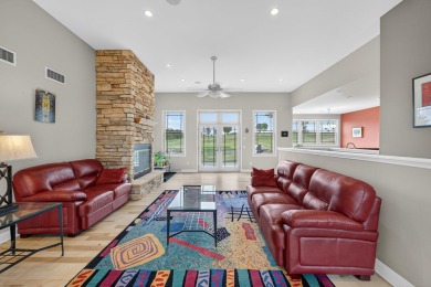 Discover this beautifully updated 4-bedroom, 3.5-bath home in on Hawks Landing Golf Club in Wisconsin - for sale on GolfHomes.com, golf home, golf lot