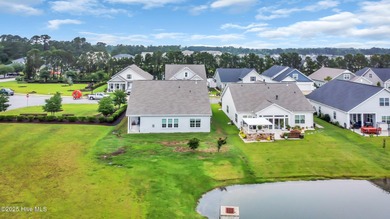 Experience refined coastal living in this rare Evans Park beauty on International Club of Myrtle Beach in South Carolina - for sale on GolfHomes.com, golf home, golf lot