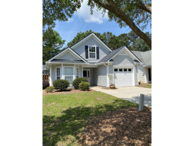 This charming home is tucked away on a quiet street in The on Golf Club At Wescott Plantation in South Carolina - for sale on GolfHomes.com, golf home, golf lot