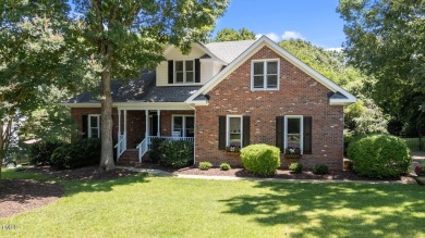 Fall in love with this beautiful custom-built brick front home on The Neuse Golf Club in North Carolina - for sale on GolfHomes.com, golf home, golf lot