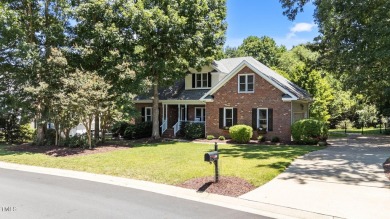 Fall in love with this beautiful custom-built brick front home on The Neuse Golf Club in North Carolina - for sale on GolfHomes.com, golf home, golf lot