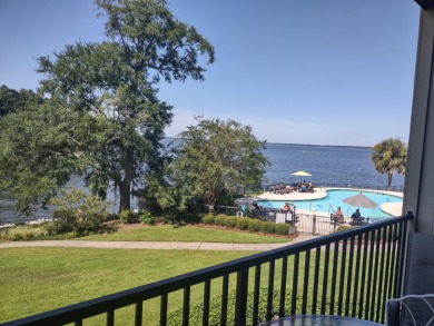 Beautiful condo overlooking Lake Marion and the pool complex on Santee-Cooper Country Club in South Carolina - for sale on GolfHomes.com, golf home, golf lot