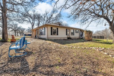 Stunning meticulously maintained Lake View Home with potential on Tanglewood Resort in Texas - for sale on GolfHomes.com, golf home, golf lot