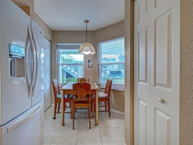 Enjoy peaceful canal views and Florida living at its finest in on Sabal Trace Golf and Country Club in Florida - for sale on GolfHomes.com, golf home, golf lot