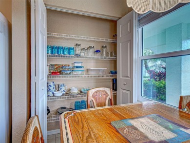 Enjoy peaceful canal views and Florida living at its finest in on Sabal Trace Golf and Country Club in Florida - for sale on GolfHomes.com, golf home, golf lot