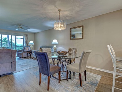 Enjoy peaceful canal views and Florida living at its finest in on Sabal Trace Golf and Country Club in Florida - for sale on GolfHomes.com, golf home, golf lot