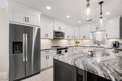 Welcome home to this beautifully fully renovated 3-bedroom on Golfview Golf and Racquet Club in Florida - for sale on GolfHomes.com, golf home, golf lot