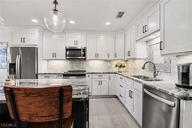 Welcome home to this beautifully fully renovated 3-bedroom on Golfview Golf and Racquet Club in Florida - for sale on GolfHomes.com, golf home, golf lot