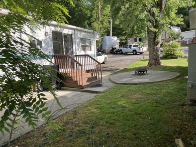 Very Nice RV lot with firepit/seating area, patio, greenspace on Bent Creek Golf Course in Tennessee - for sale on GolfHomes.com, golf home, golf lot