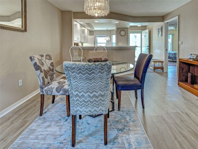 Enjoy peaceful canal views and Florida living at its finest in on Sabal Trace Golf and Country Club in Florida - for sale on GolfHomes.com, golf home, golf lot