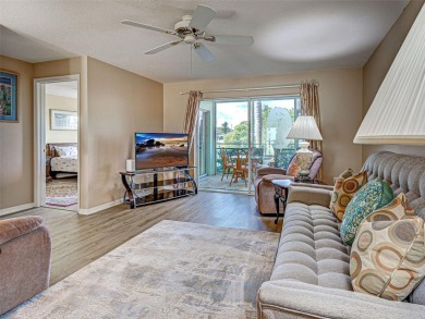 Enjoy peaceful canal views and Florida living at its finest in on Sabal Trace Golf and Country Club in Florida - for sale on GolfHomes.com, golf home, golf lot