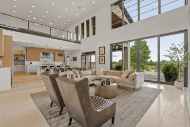 A showcase of modern elegance, this 6-bed, 7.5-bath contemporary on Paragould Country Club in Arkansas - for sale on GolfHomes.com, golf home, golf lot