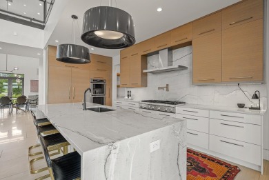 A showcase of modern elegance, this 6-bed, 7.5-bath contemporary on Paragould Country Club in Arkansas - for sale on GolfHomes.com, golf home, golf lot