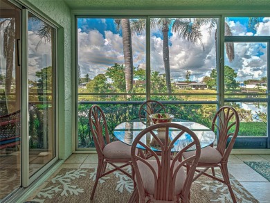 Enjoy peaceful canal views and Florida living at its finest in on Sabal Trace Golf and Country Club in Florida - for sale on GolfHomes.com, golf home, golf lot