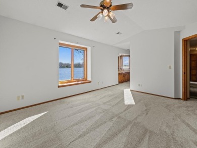 Spacious, scenic, and serene, this 4-bedroom, 3-bath lake house on Chomonix Golf Course in Minnesota - for sale on GolfHomes.com, golf home, golf lot