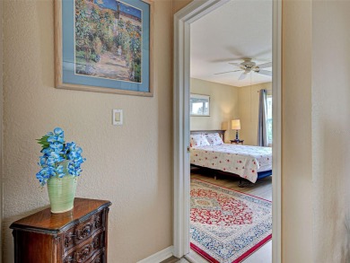 Enjoy peaceful canal views and Florida living at its finest in on Sabal Trace Golf and Country Club in Florida - for sale on GolfHomes.com, golf home, golf lot