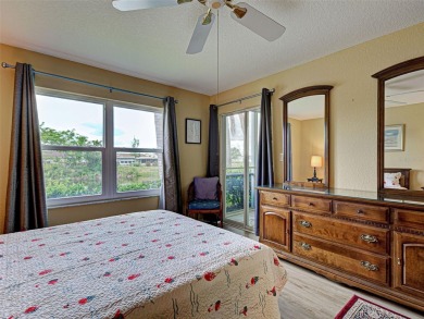 Enjoy peaceful canal views and Florida living at its finest in on Sabal Trace Golf and Country Club in Florida - for sale on GolfHomes.com, golf home, golf lot
