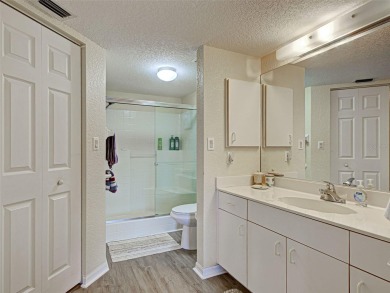Enjoy peaceful canal views and Florida living at its finest in on Sabal Trace Golf and Country Club in Florida - for sale on GolfHomes.com, golf home, golf lot