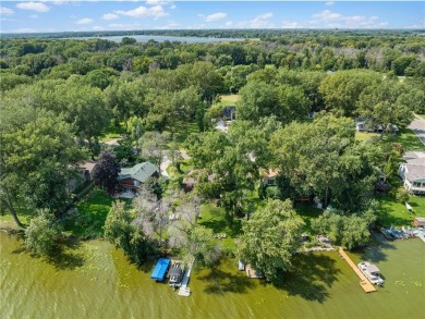 Spacious, scenic, and serene, this 4-bedroom, 3-bath lake house on Chomonix Golf Course in Minnesota - for sale on GolfHomes.com, golf home, golf lot