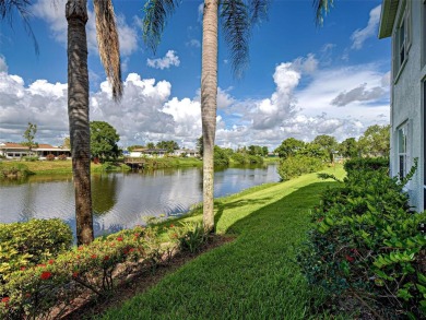 Enjoy peaceful canal views and Florida living at its finest in on Sabal Trace Golf and Country Club in Florida - for sale on GolfHomes.com, golf home, golf lot