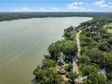 Spacious, scenic, and serene, this 4-bedroom, 3-bath lake house on Chomonix Golf Course in Minnesota - for sale on GolfHomes.com, golf home, golf lot