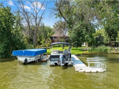 Spacious, scenic, and serene, this 4-bedroom, 3-bath lake house on Chomonix Golf Course in Minnesota - for sale on GolfHomes.com, golf home, golf lot