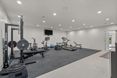 A showcase of modern elegance, this 6-bed, 7.5-bath contemporary on Paragould Country Club in Arkansas - for sale on GolfHomes.com, golf home, golf lot