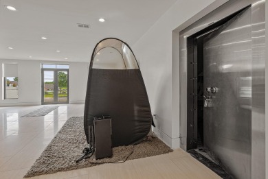 A showcase of modern elegance, this 6-bed, 7.5-bath contemporary on Paragould Country Club in Arkansas - for sale on GolfHomes.com, golf home, golf lot