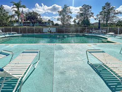Enjoy peaceful canal views and Florida living at its finest in on Sabal Trace Golf and Country Club in Florida - for sale on GolfHomes.com, golf home, golf lot