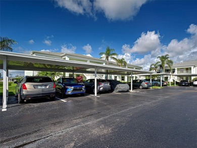 Enjoy peaceful canal views and Florida living at its finest in on Sabal Trace Golf and Country Club in Florida - for sale on GolfHomes.com, golf home, golf lot