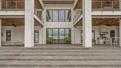 A showcase of modern elegance, this 6-bed, 7.5-bath contemporary on Paragould Country Club in Arkansas - for sale on GolfHomes.com, golf home, golf lot