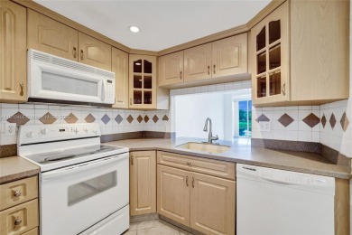Beautifully maintained 2-bedroom, 2-bath in the highly on Pine Island Ridge Country Club in Florida - for sale on GolfHomes.com, golf home, golf lot