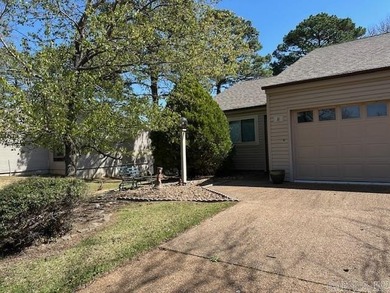 This two-bedroom, two-bathroom condominium, partially furnished on Indian Hills Country Club in Arkansas - for sale on GolfHomes.com, golf home, golf lot