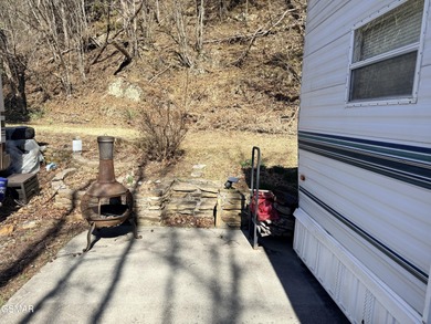 Nice RV lot backed up to the mountain giving you a more private on Bent Creek Golf Course in Tennessee - for sale on GolfHomes.com, golf home, golf lot