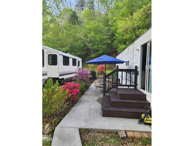 Nice RV lot backed up to the mountain giving you a more private on Bent Creek Golf Course in Tennessee - for sale on GolfHomes.com, golf home, golf lot