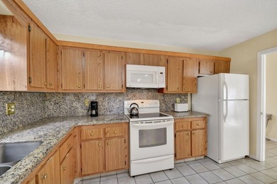 JUST ANNOUNCED - SELLERS WILL REPLACE THE PEAKED ROOF BEFORE on Poinciana Golf Club in Florida - for sale on GolfHomes.com, golf home, golf lot