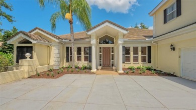 This 4 bedroom with 5 full, and 1 half bath, a new roof and on The Oaks Club in Florida - for sale on GolfHomes.com, golf home, golf lot
