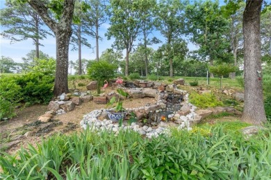 Welcome to luxury! Nestled on nearly an acre across two prime on Holiday Island Golf Course in Arkansas - for sale on GolfHomes.com, golf home, golf lot
